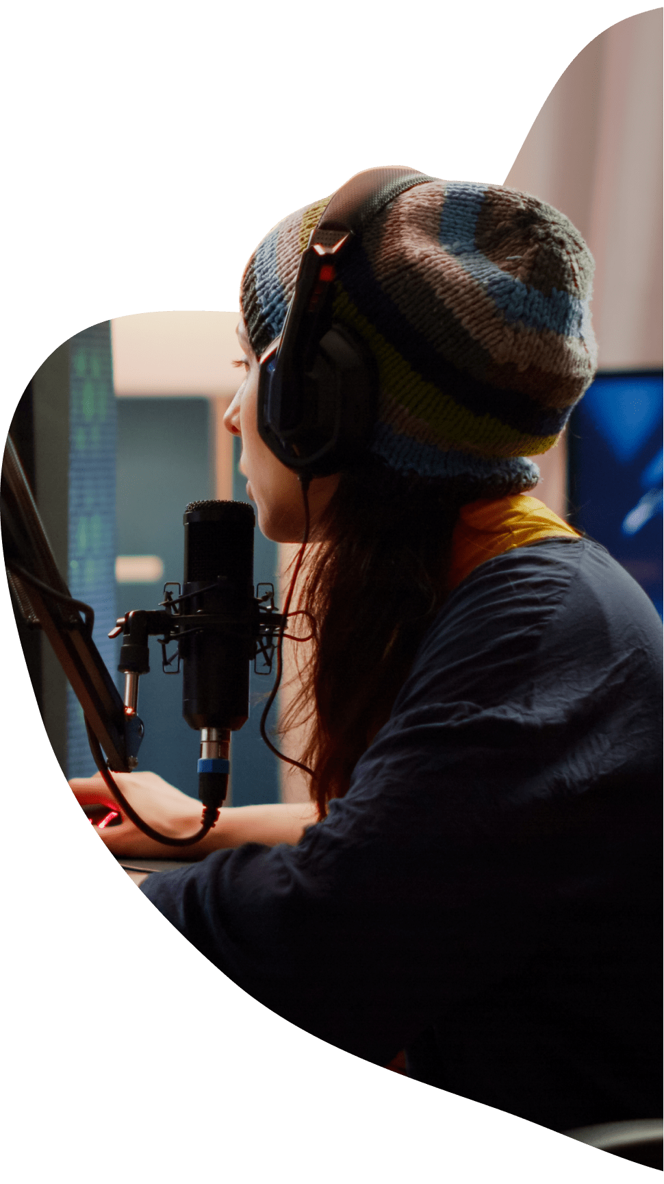 woman at computer with podcast set